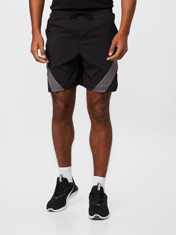 PUMA Regular Workout Pants in Black: front