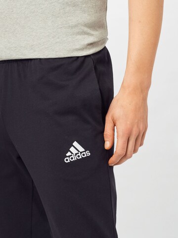 juoda ADIDAS SPORTSWEAR Prigludęs Sportinės kelnės 'Essentials Tapered'