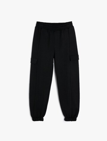 Koton Tapered Trousers in Black: front