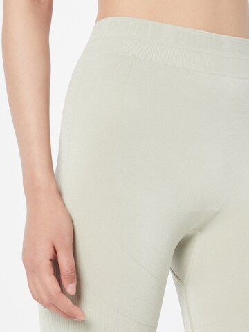 PUMA Skinny Sportbroek in Groen