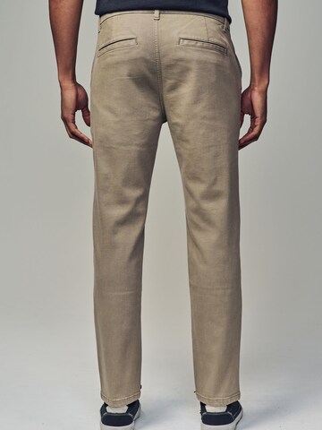 Slimfit Pantaloni chino di Next in beige