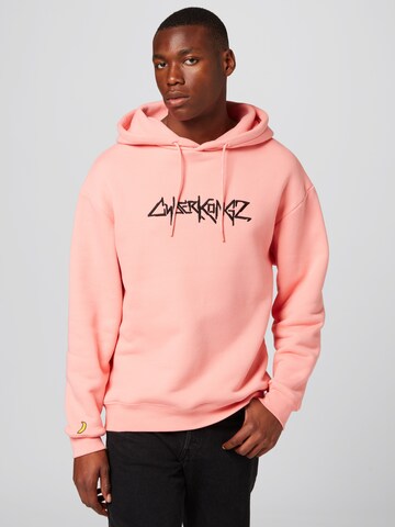 Sweat-shirt 'Leo' About You x Cyberkongz en rose : devant