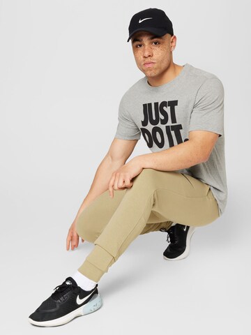 Nike Sportswear - Camisa em cinzento
