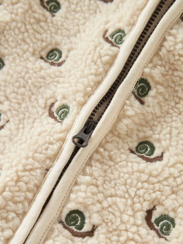 Lil'Atelier - Mono en blanco