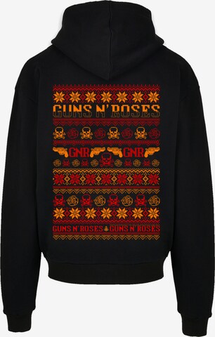 Sweat-shirt 'Guns And Roses Weihnachten Christmas' F4NT4STIC en noir