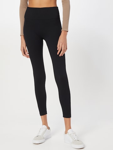 Skinny Pantalon de sport Athlecia en noir : devant