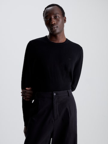 Pull-over Calvin Klein en noir : devant