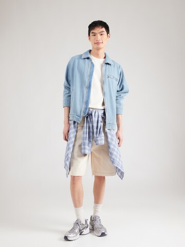 Maglietta di Revolution in bianco