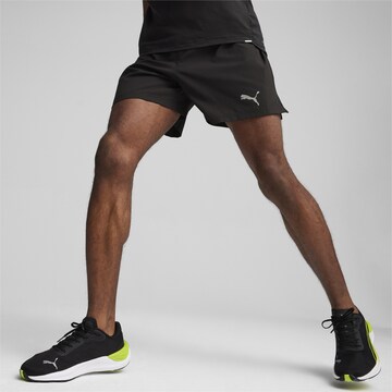 PUMA Regular Workout Pants in Black: front
