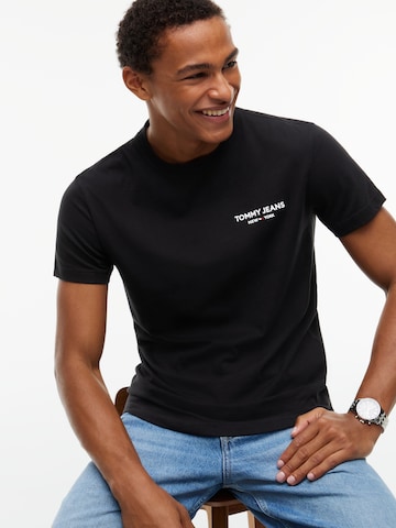 Tommy Jeans - Camiseta 'NY' en negro: lado