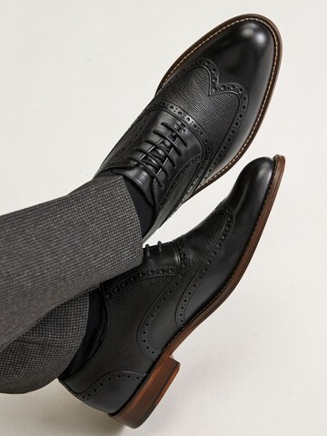 Chaussure à lacets Next en noir