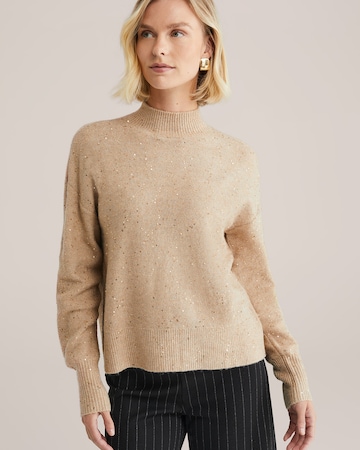 Pulover de la WE Fashion pe bej: față