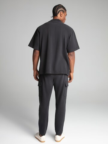 regular Pantaloni di SikSilk in nero