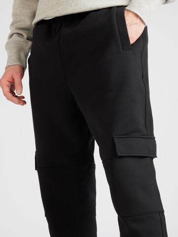 TOPMAN - Tapered Pantalón en negro