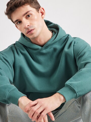 Abercrombie & Fitch Sweatshirt 'ESSENTIALS' in Groen