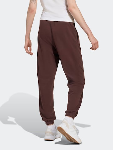 ADIDAS SPORTSWEAR Tapered Παντελόνι φόρμας 'Essentials' σε καφέ