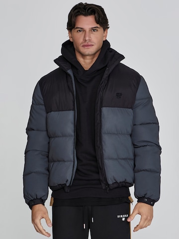 Veste mi-saison SikSilk en bleu : devant