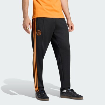 ADIDAS PERFORMANCE Tapered Παντελόνι φόρμας 'Ajax Amsterdam' σε μαύρο: μπροστά
