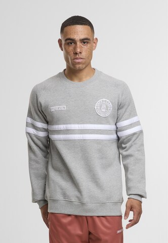 Unfair Athletics Sweatshirt 'DMWU' in Grijs: voorkant