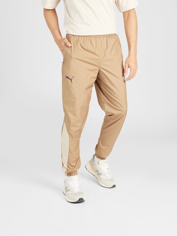 PUMA - Tapered Pantalón deportivo 'MCFC Prematch' en beige: frente