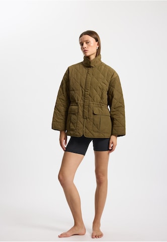 Veste mi-saison 'Lyon ' rethinkit studios en vert