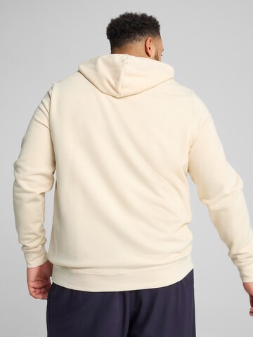 PUMA Bluzka sportowa 'Essentials No. 1' w kolorze beżowy