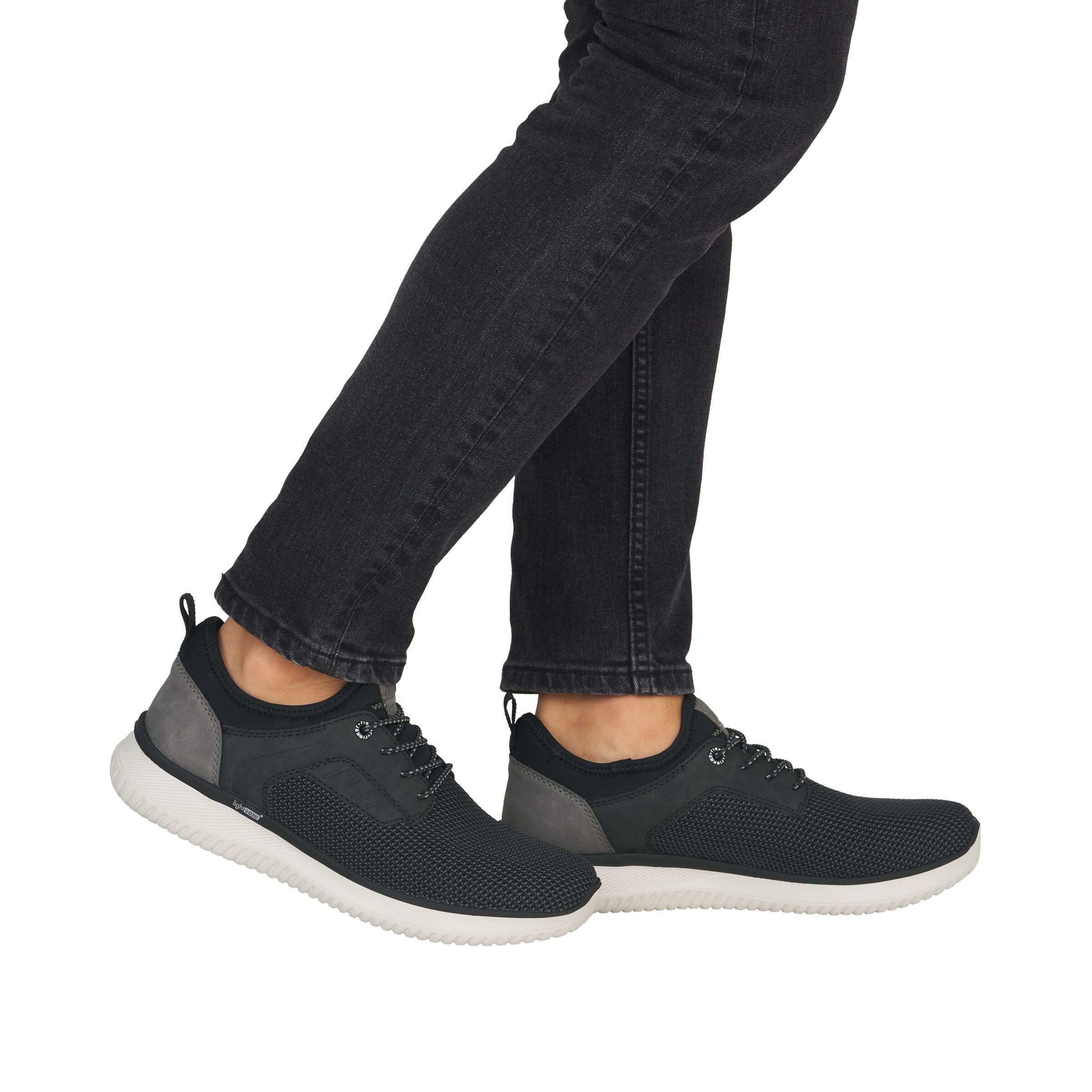 Rieker Slip on in Schwarz
