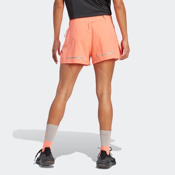 ADIDAS PERFORMANCE Regular Workout Pants in Orange