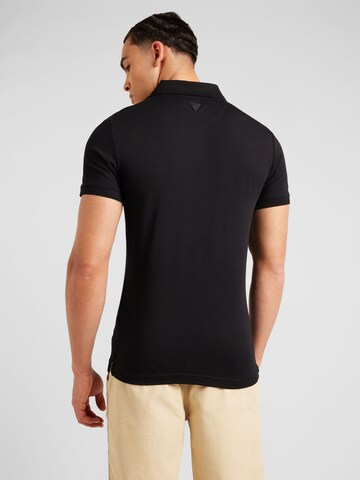 GUESS Poloshirt 'NOLAN' in Schwarz