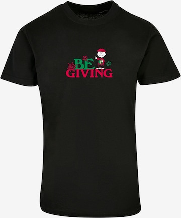 Merchcode Shirt 'Peanuts Be Giving' in Zwart: voorkant