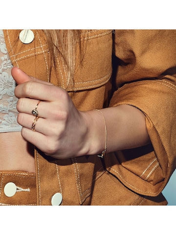 caï Ring in Gelb: Vorderseite