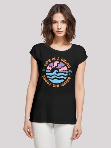T-shirt 'Life Is A Beach Enjoy The Waves' F4NT4STIC en noir : devant