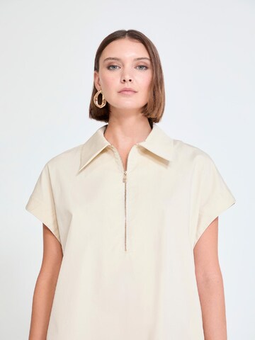 Robe Lola Casademunt en beige