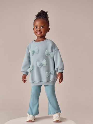 Set Next en bleu