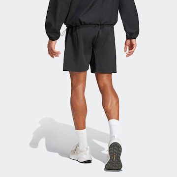 Largi Pantaloni sport 'City Escape' de la ADIDAS SPORTSWEAR pe negru