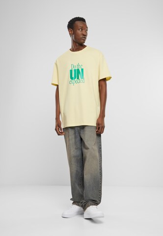 T-Shirt 'Do The Unexpected' MT Upscale en jaune