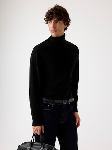 Pull-over GUESS en noir : devant