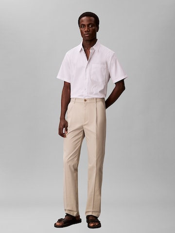 Calvin Klein Regular Pleat-Front Pants in Beige