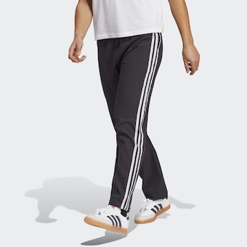 ADIDAS PERFORMANCE Regular Workout Pants 'The Trackstand' in Black: front