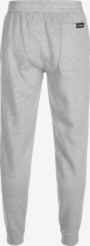 UNDER ARMOUR Tapered Sporthose in Grau