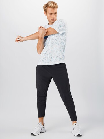 NIKE Tapered Sportbroek in Zwart