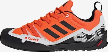 ADIDAS TERREX Athletic Shoes 'Swift Solo 2.0' in Orange: front