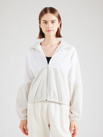 Veste de sport 'Rival' UNDER ARMOUR en blanc : devant