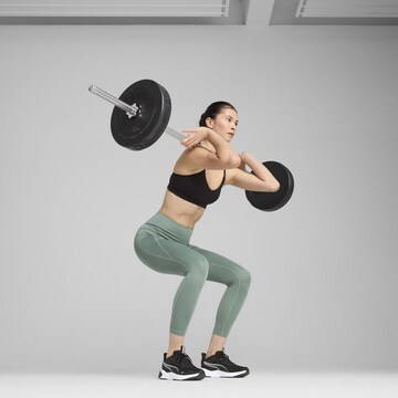 PUMA Skinny Leggings in Grün