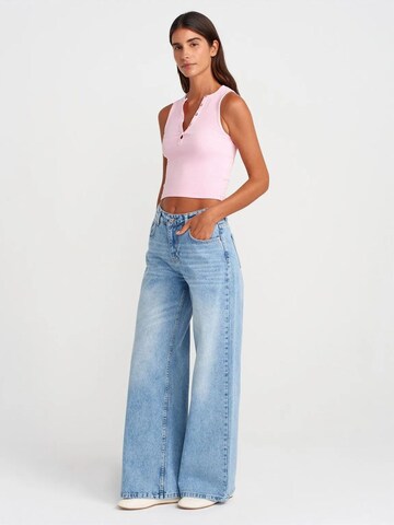 Top di Dilvin in rosa