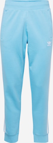 ADIDAS ORIGINALS Tapered Trousers in Blue: front