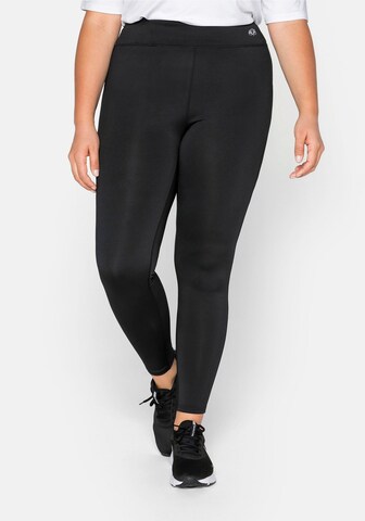 Skinny Pantaloni sport de la SHEEGO pe negru: față