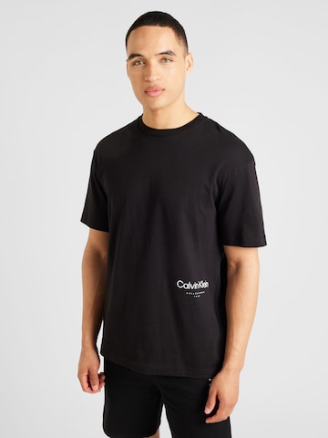 T-Shirt 'OFF PLACEMENT' Calvin Klein en noir : devant