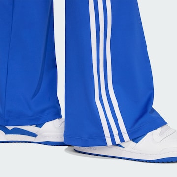 ADIDAS ORIGINALSFlared/zvonoliki kroj Tajice - plava boja