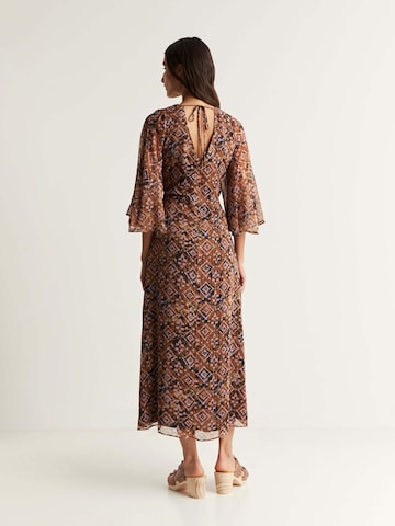 Scalpers Dress in Brown
